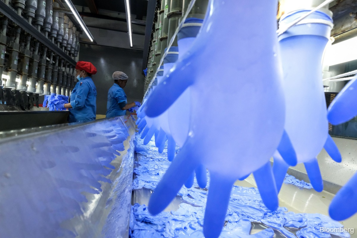 Analysts say US-China tariff cuts are negative for Malaysian glove makers